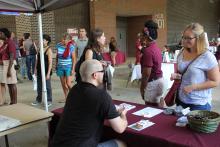 students browsing booths 