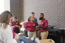 COGS students talking with other students