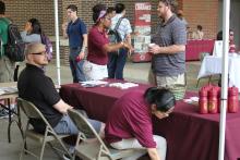 students browsing booths 