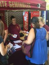 students browsing a table