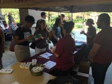 students browsing a table