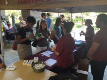 students browsing a table