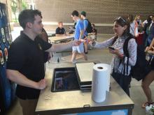 students browsing a table
