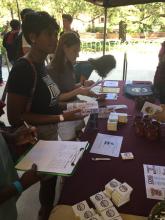 students browsing a table