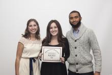 three people posing for a picture together
