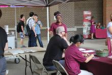 students browsing booths 