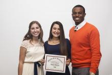 three people posing for a picture together