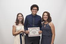 three people posing for a picture together