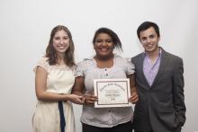 three people posing for a picture together