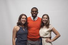 three people posing for a picture together