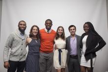 six people posing for a picture together