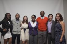 seven people posing for a picture together
