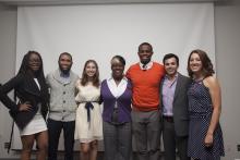 seven people posing for a picture together