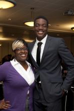two people posing for a picture together