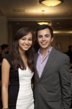 two people posing for a picture together