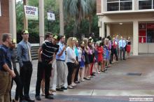 long line of students waiting outside