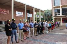 long line of students waiting outside